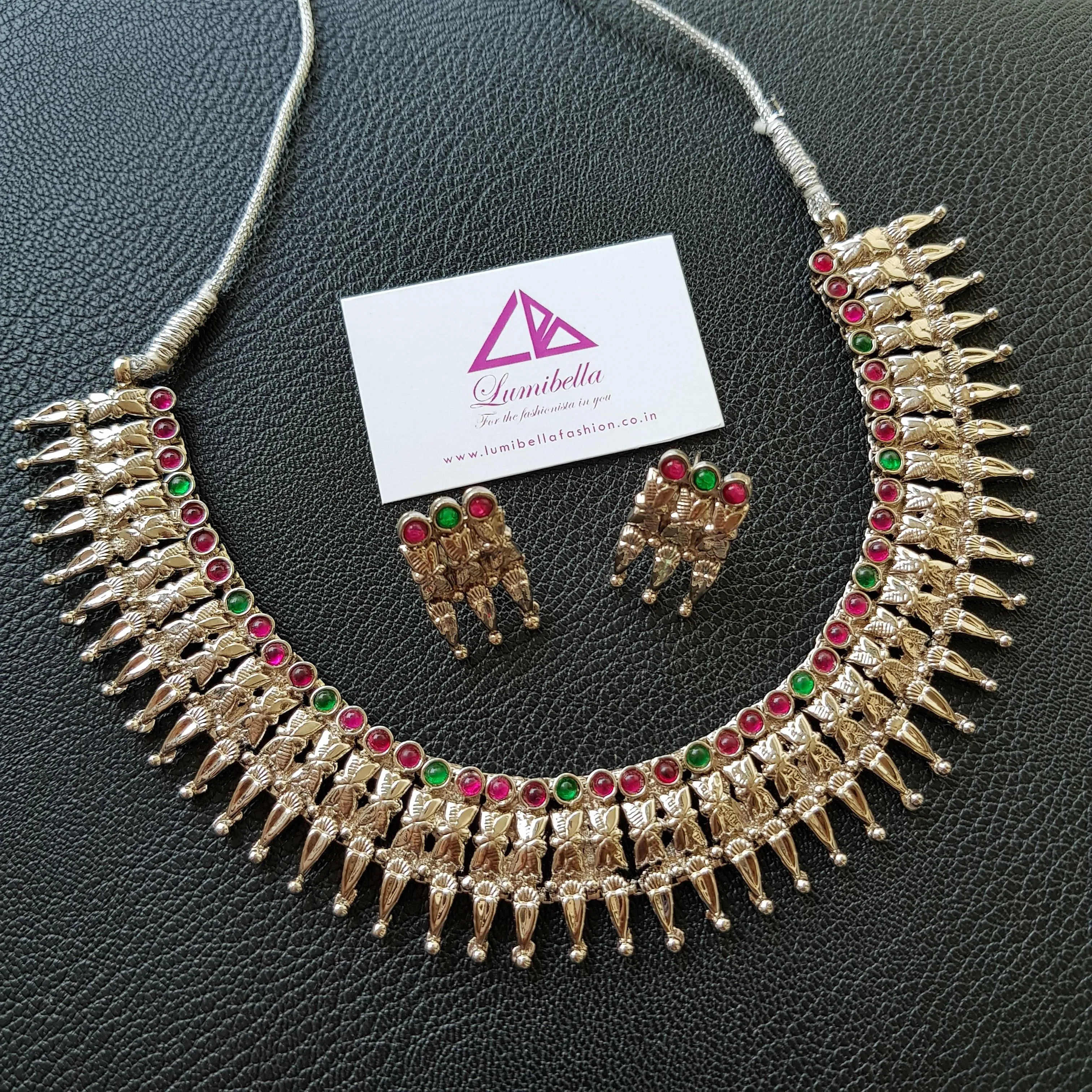 Floral patterned ruby and green kemp stone embellished