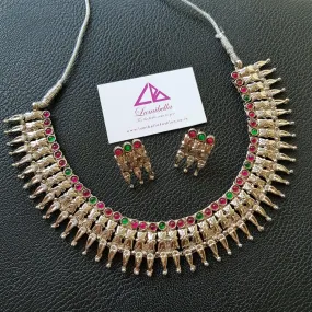 Floral patterned ruby and green kemp stone embellished