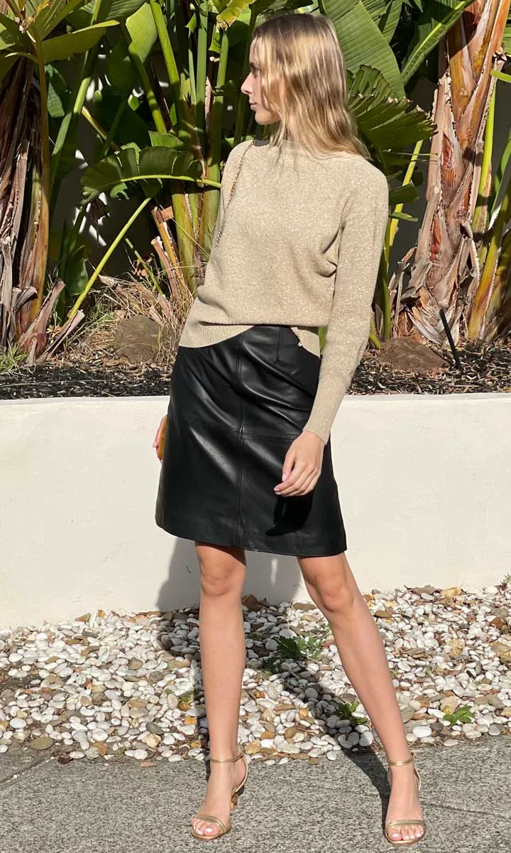 Sure, heres an optimized title for the e-commerce product with modifiers included:

Hoss Leather High-Waist A-Line Michelle Black Skirt for Women

This title includes key modifiers such as the skirts fit (A-Line), the waist style (High-Waist), the material (Leather), and the intended customer (Women) for better search optimization.